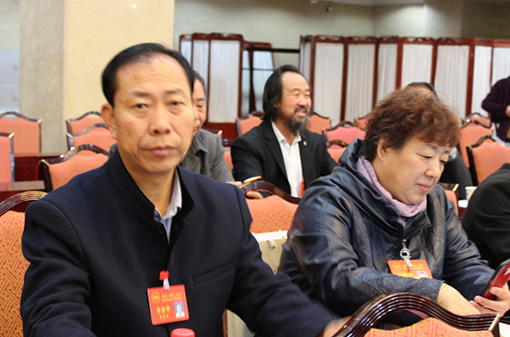 李金华参加峰会现场.png