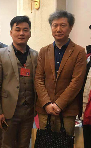 袁国力《美术》杂志执行主编尚辉合影.jpg