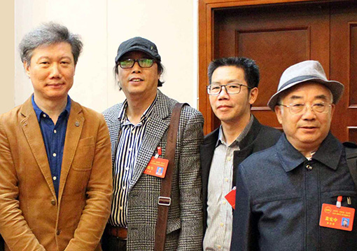与中国美术家协会理事、中国文艺评论家协会理事、《美术》杂志执行主编尚辉先生合影.jpg
