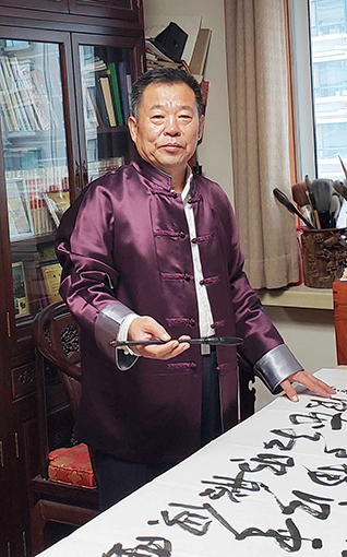 1555382239917007.jpg 周有信老师.jpg