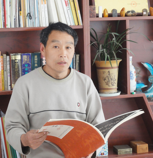 向中国民族建筑企业重点推荐的百位书画艺术名家——李海圣